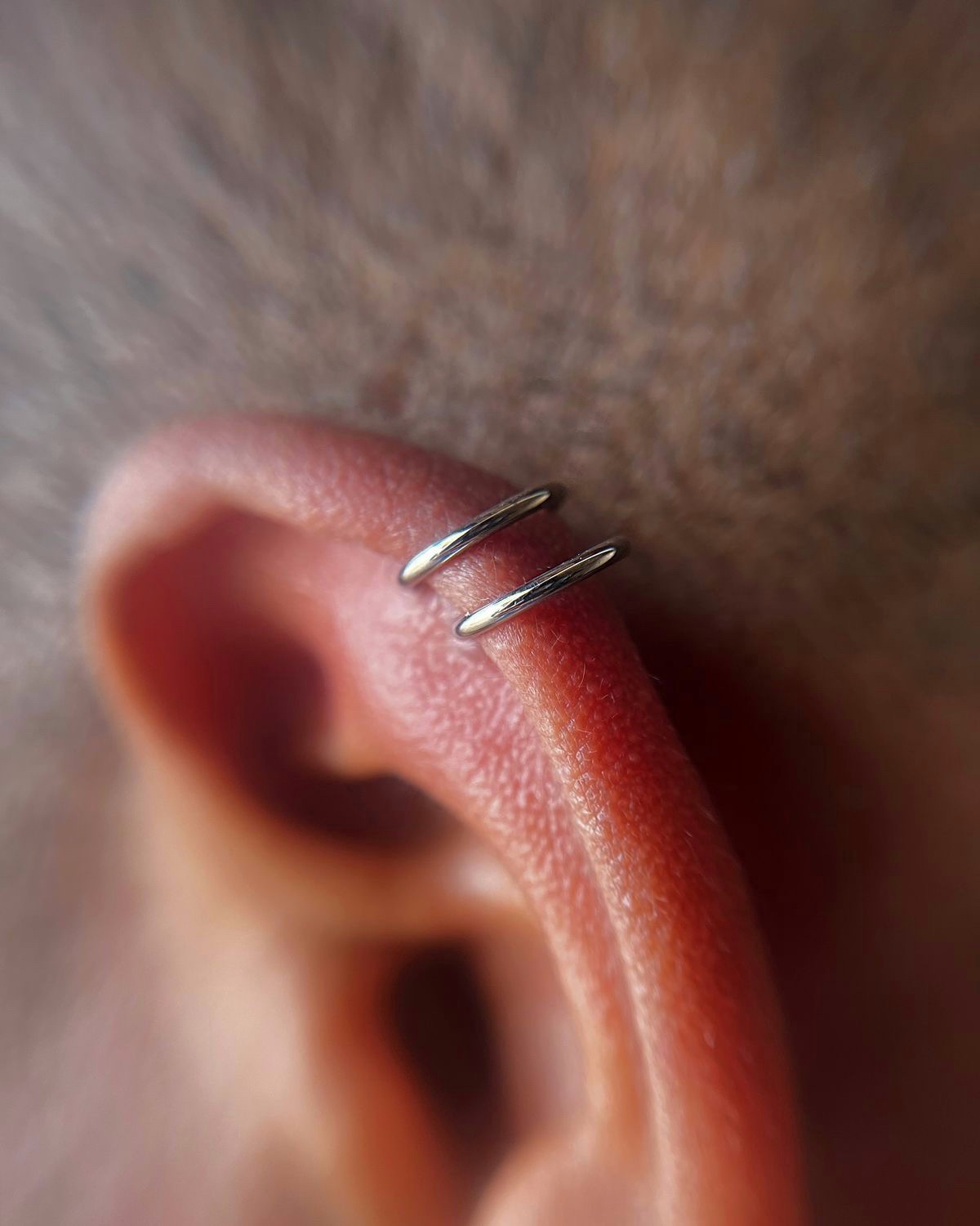 Doble perforación Helix